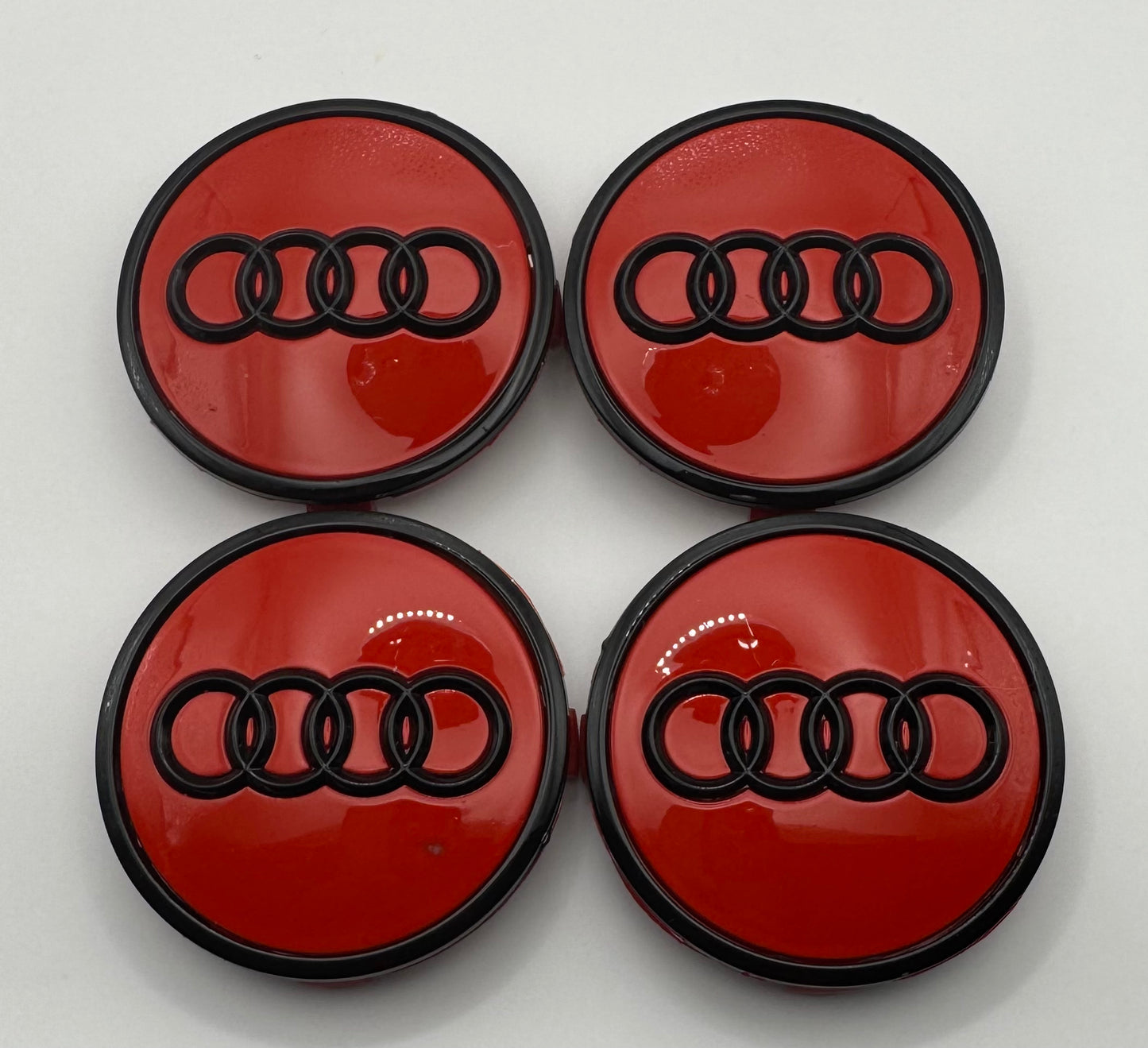 AUDI RED BLACK ALLOY WHEEL CENTRE CAPS (#AMEAU23REDBLACK)