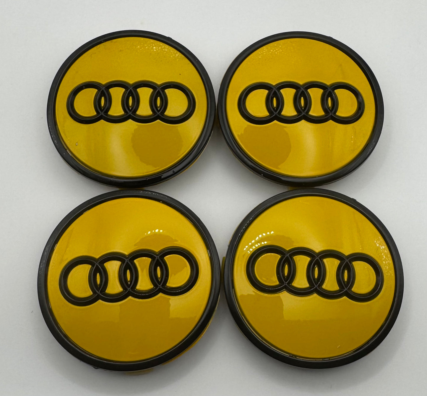 AUDI YELLOW BLACK ALLOY WHEEL CENTRE CAPS (#AMEAU19YELLOWBLACK)